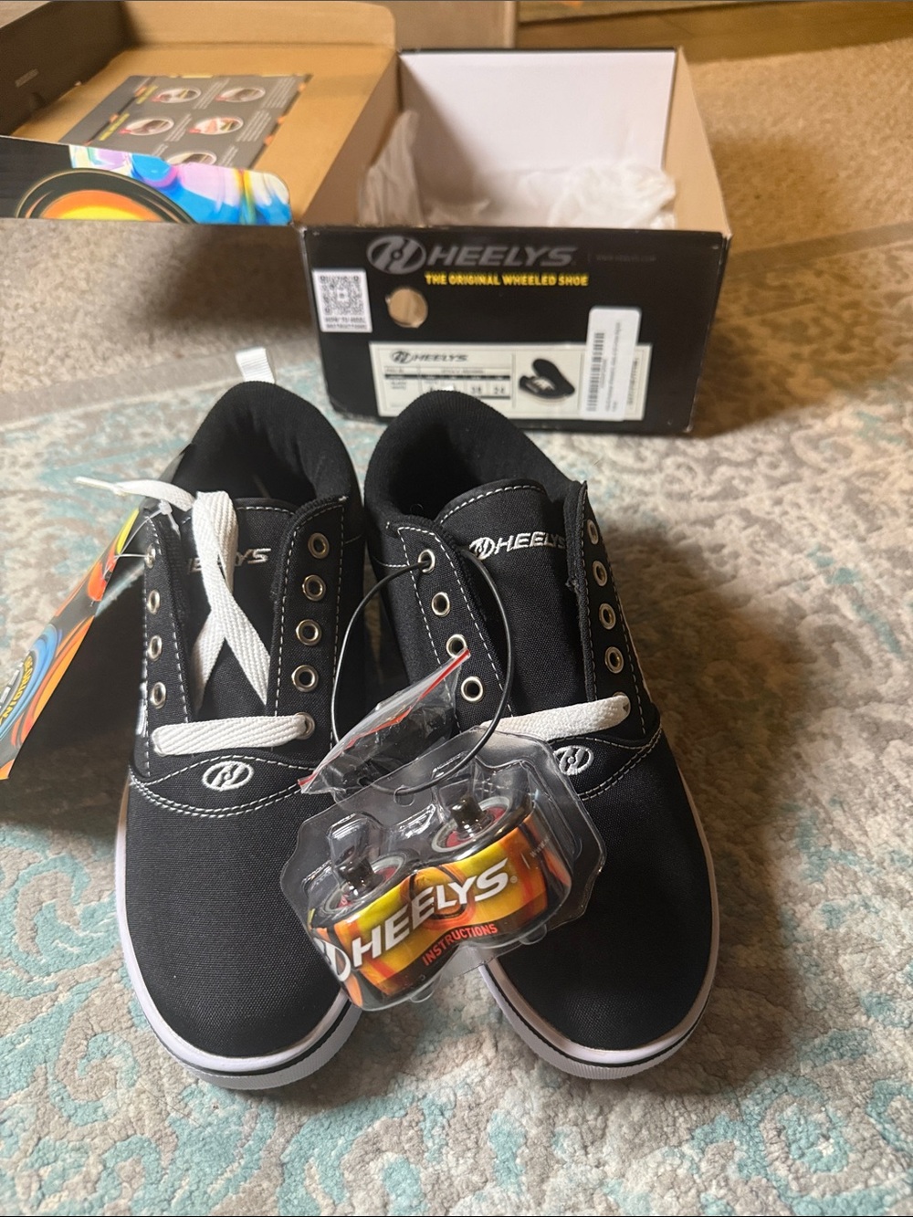 Heelys Black Canvas Kids' Shoes with White Accents
